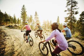 Women mountain biking