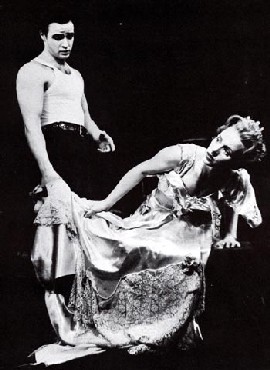 A black and white photograph of Marlon Brando in an undershirt