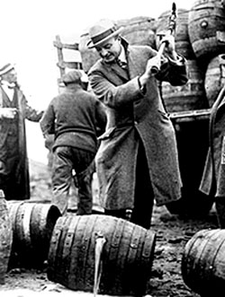 Police destroying barrels of beer