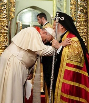 Pope Francis bows to Bartholomew