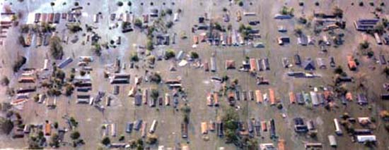 dozens of houses submerged under flood waters